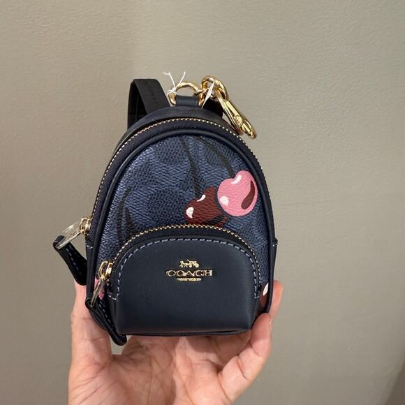 Coach CZ086 Mini Court Backpack Bag Charm In Signature Canvas With Cherry Print - Picture 1 of 16